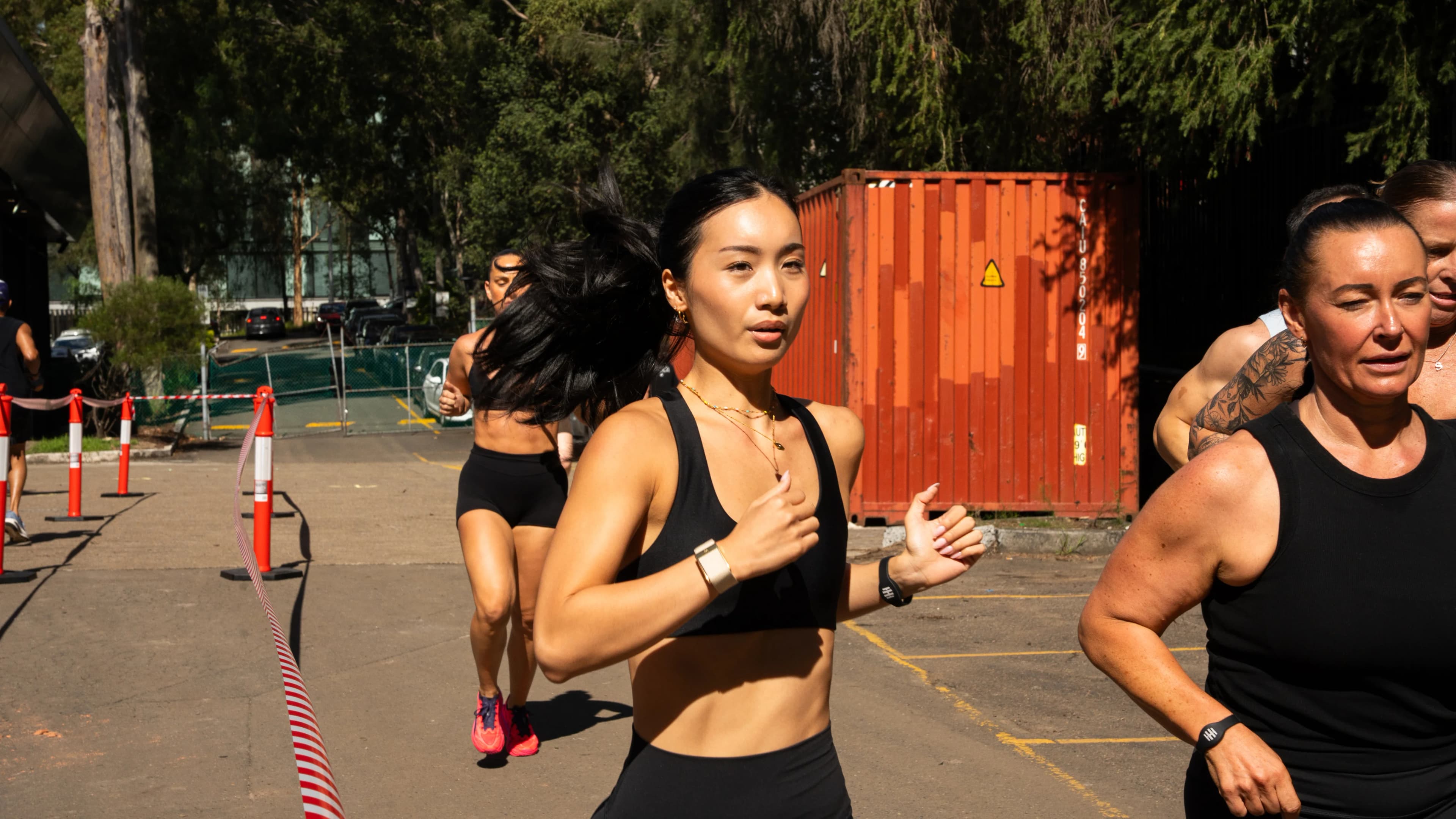 Housed ambassador wearing brand naturally during outdoor and gym training sessions