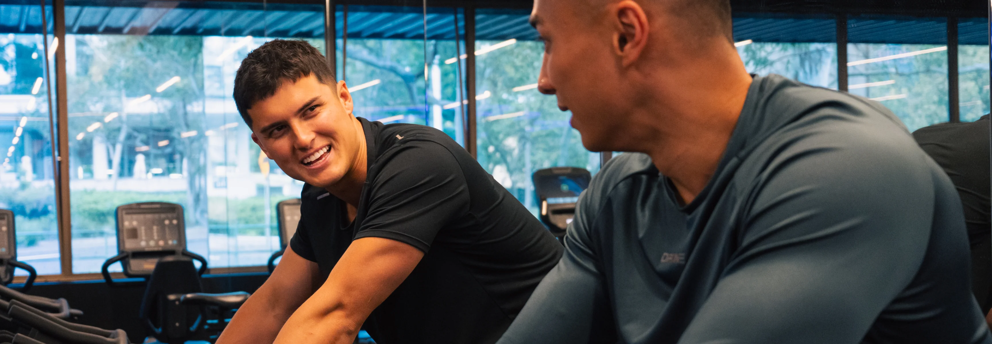 Group fitness classes at Housed Sydney - personal trainers helping members with fitness training