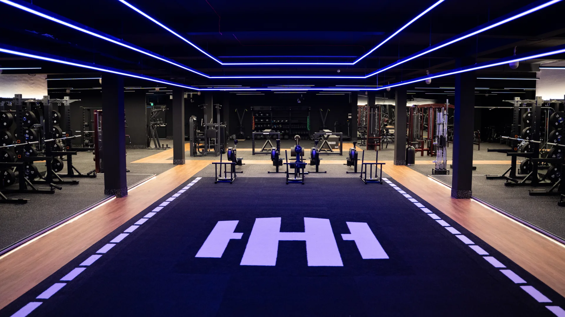 Housed Hurstville gym floor with state-of-the-art fitness equipment, cardio machines and strength training areas