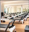Housed Sydney reformer pilates and gym membership combo offering professional pilates studio with reformer equipment and full gym access