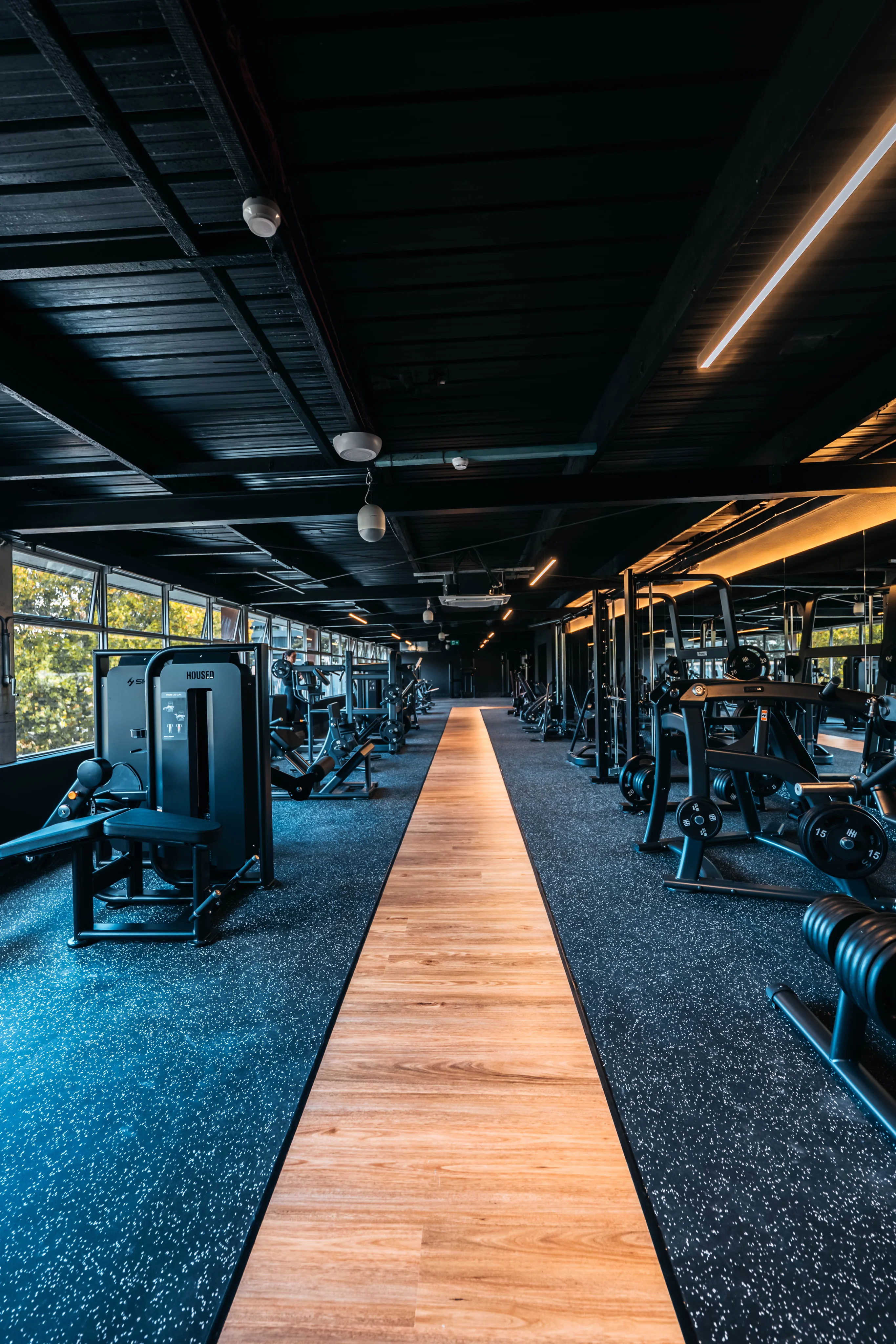 Housed Gosford fitness club interior with modern gym equipment, pilates studio, and reception area