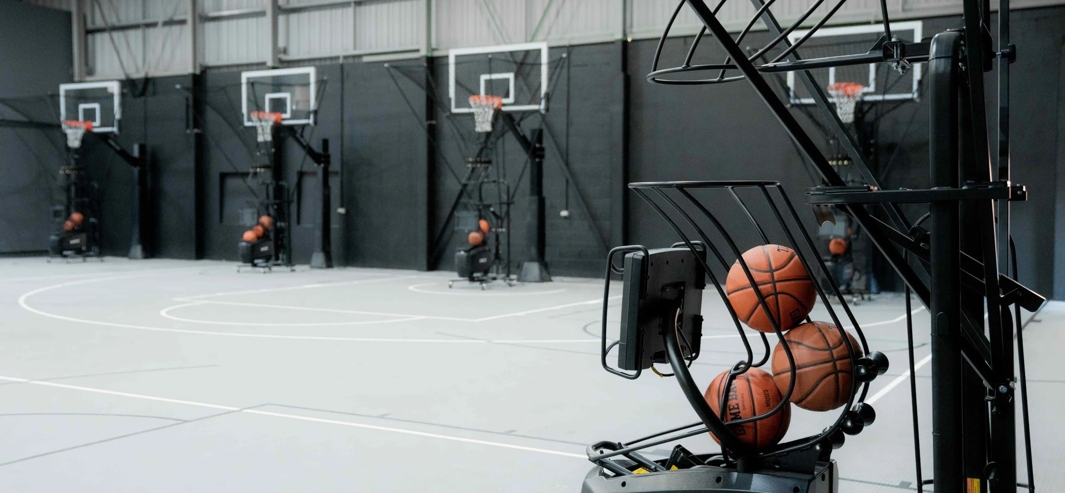 Premium indoor basketball court in Chatswood with 3 half courts, shooting machines & expert coaching.
