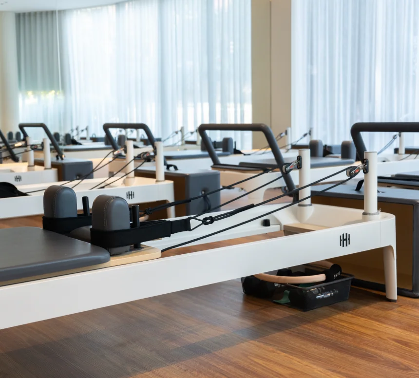 Housed Chatswood reformer pilates studio at 27 Albert Avenue showing professional pilates equipment, spacious workout area, modern reception, and fitness facilities in Chatswood